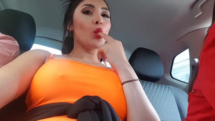 Naughty tease in the car with people around